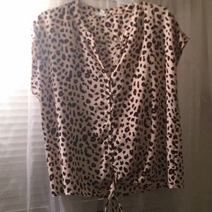 A cheetah print blouse